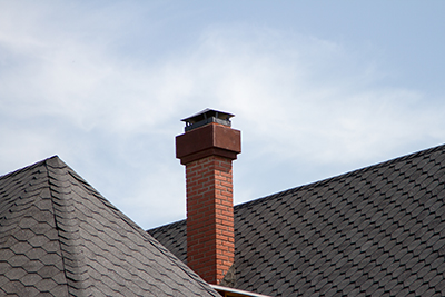 Brick Chimney on Residential Roof